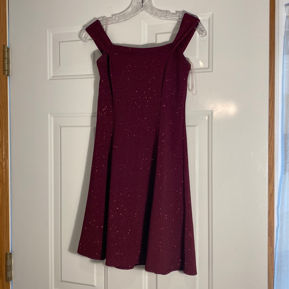 Xtraordinary burgundy dress size 7.